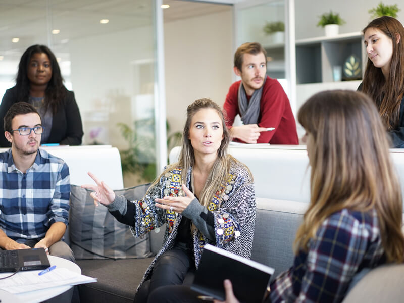 Six people in a meeting - Technology Talk